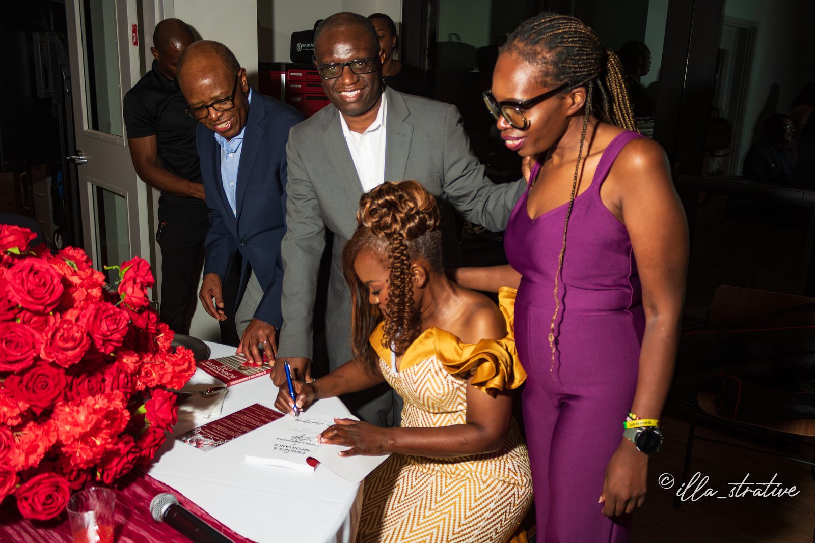 Guests signing an interactive guest experience at a Zuri Visuals event